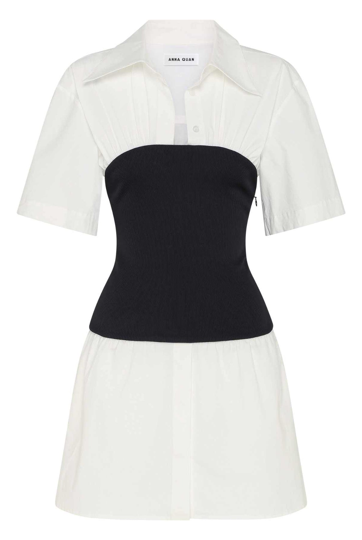 ANNA QUAN's unique Soft Tailoring Mini White Shirt Dress, featuring a contrast jersey rib column skirt. This chic fusion of elements combines the timeless appeal of a white shirt with a modern twist in the torso. White shirt dress, cotton shirt dress, mixed media dress, every day dress, elevated every day dress.