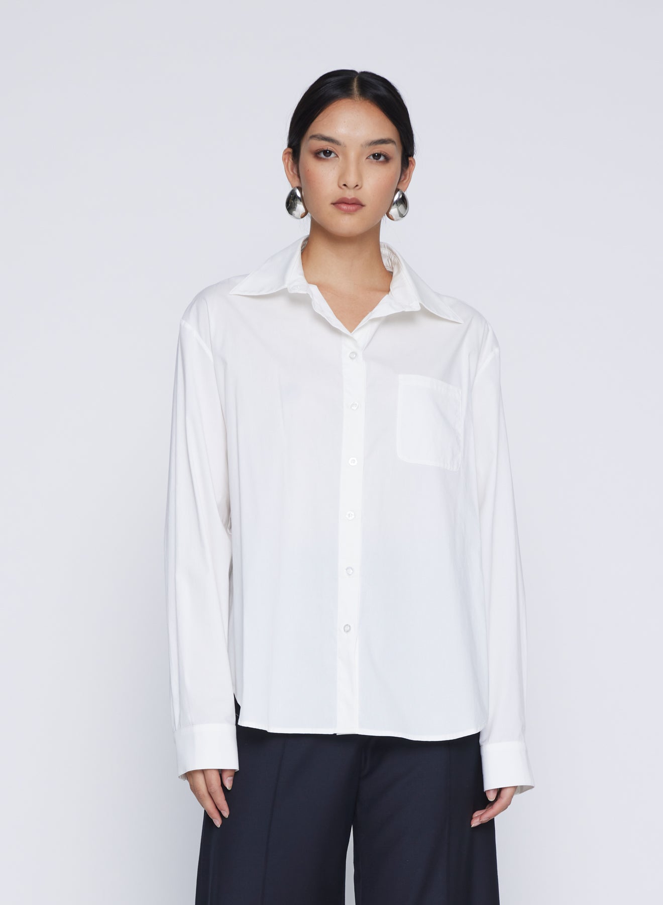 ANNA QUAN'S Signature Collection - introducing the Brooklyn Classic White Shirt, a timeless wardrobe essential. Embrace a touch of sophistication with this versatile piece, designed to elevate your style effortlessly.