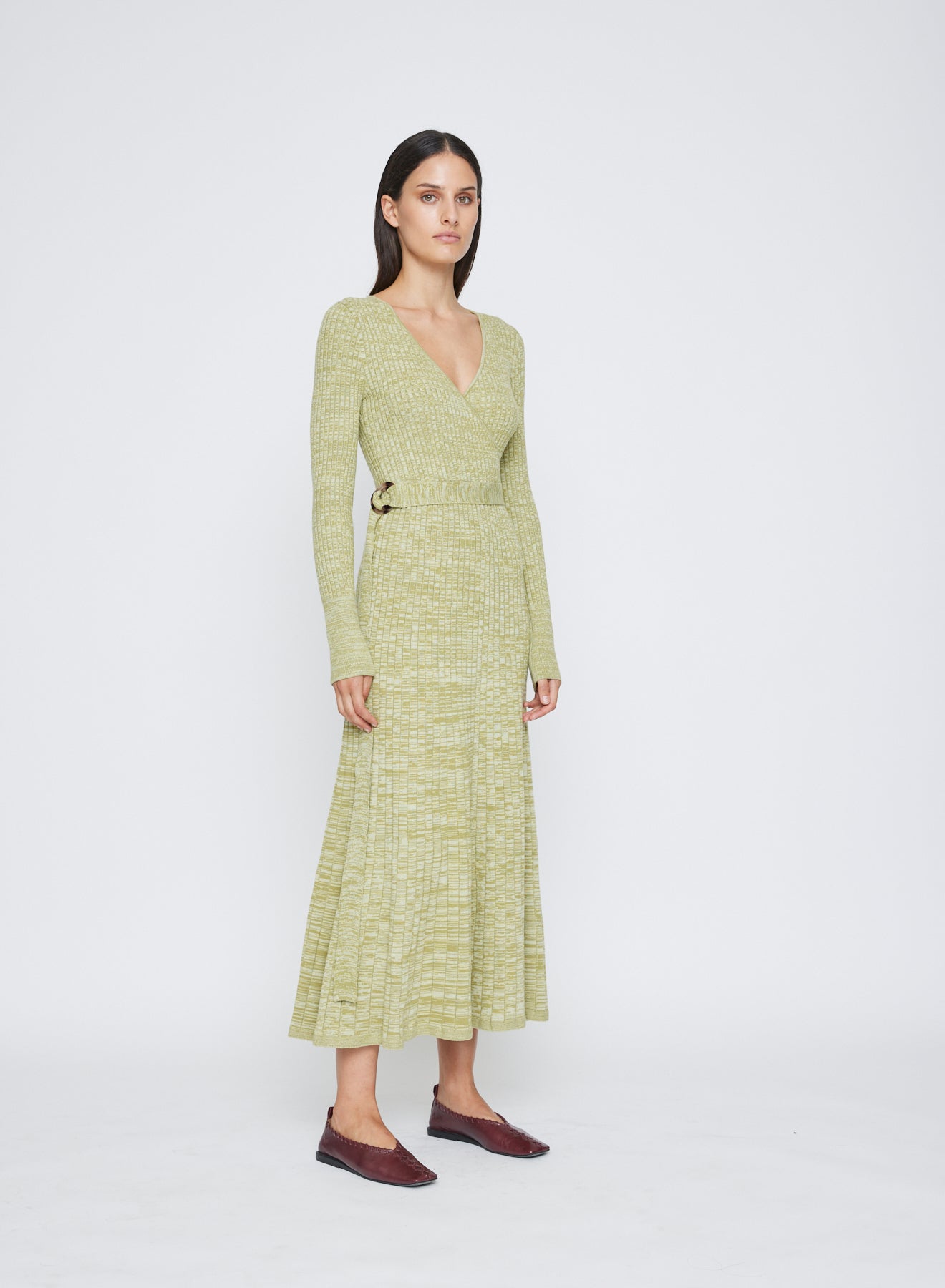 Wrap Midi Knit Dress with a stylish waist belt and resin belt, combining comfort and sophistication for everyday wear. A-line skirt and v-neckline with long sleeves and the hem skimming the ankle. Workwear dress, Winter dress, everyday dress, long sleeve dress.