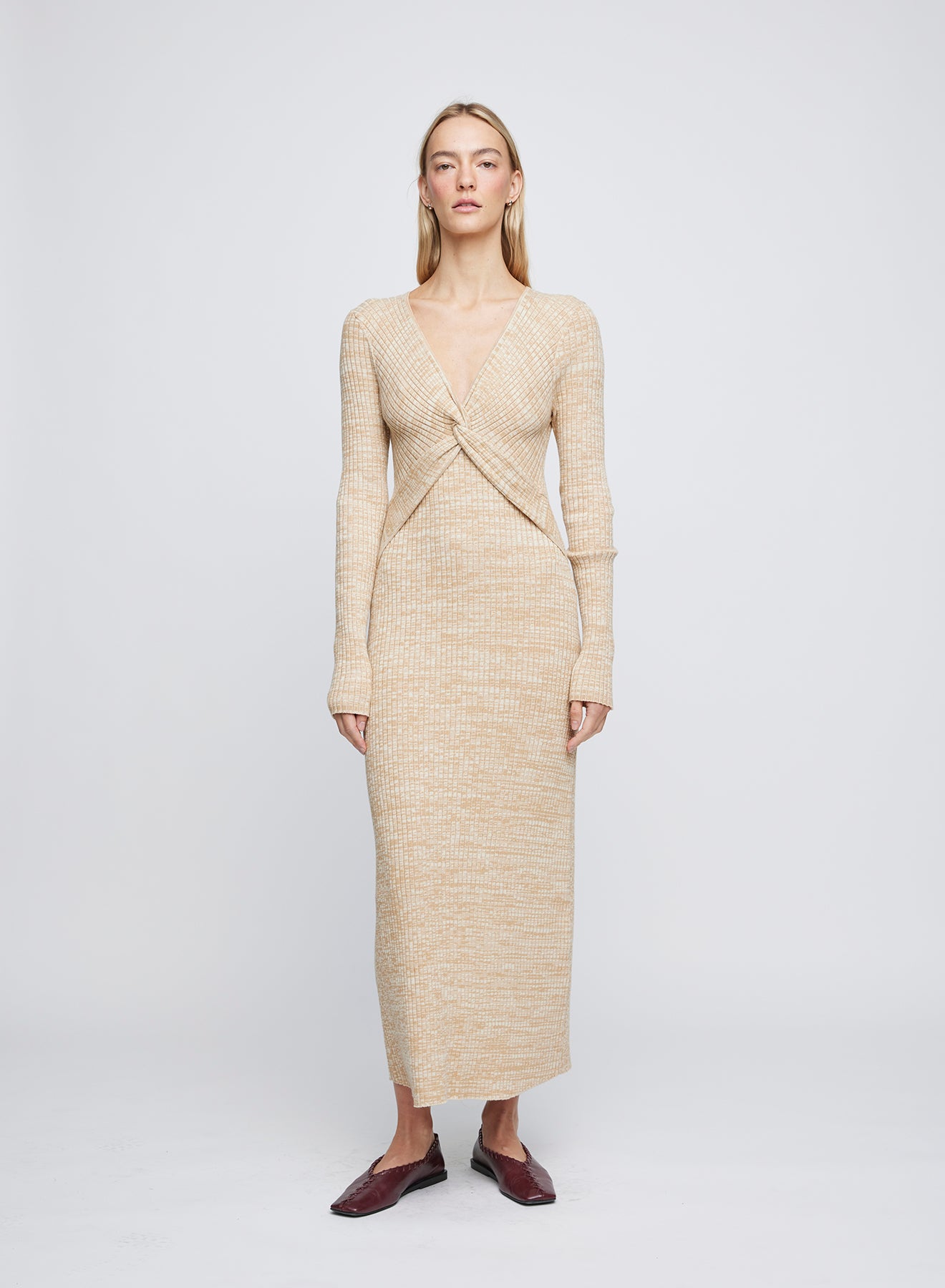 The ANNA QUAN Nova Dress is the dress for any occasion, designed in a soft 100% cotton rib that stretches and sculpts the body. Completed with a v neckline and centre front twist for a modern touch.