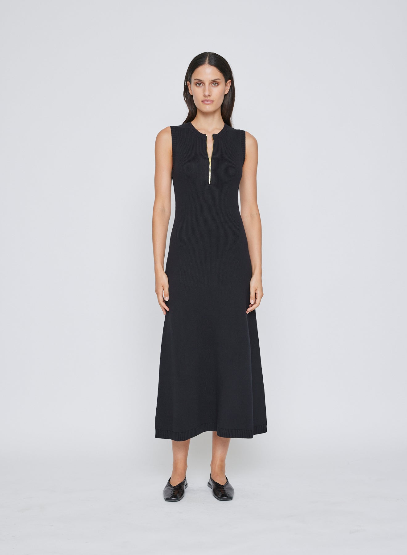 The ANNA QUAN Jennie Dress in Raven is an elevated day to night midi dress, cut in 100% cotton knit. Featuring a sleeveless design and zip closure at the bust.