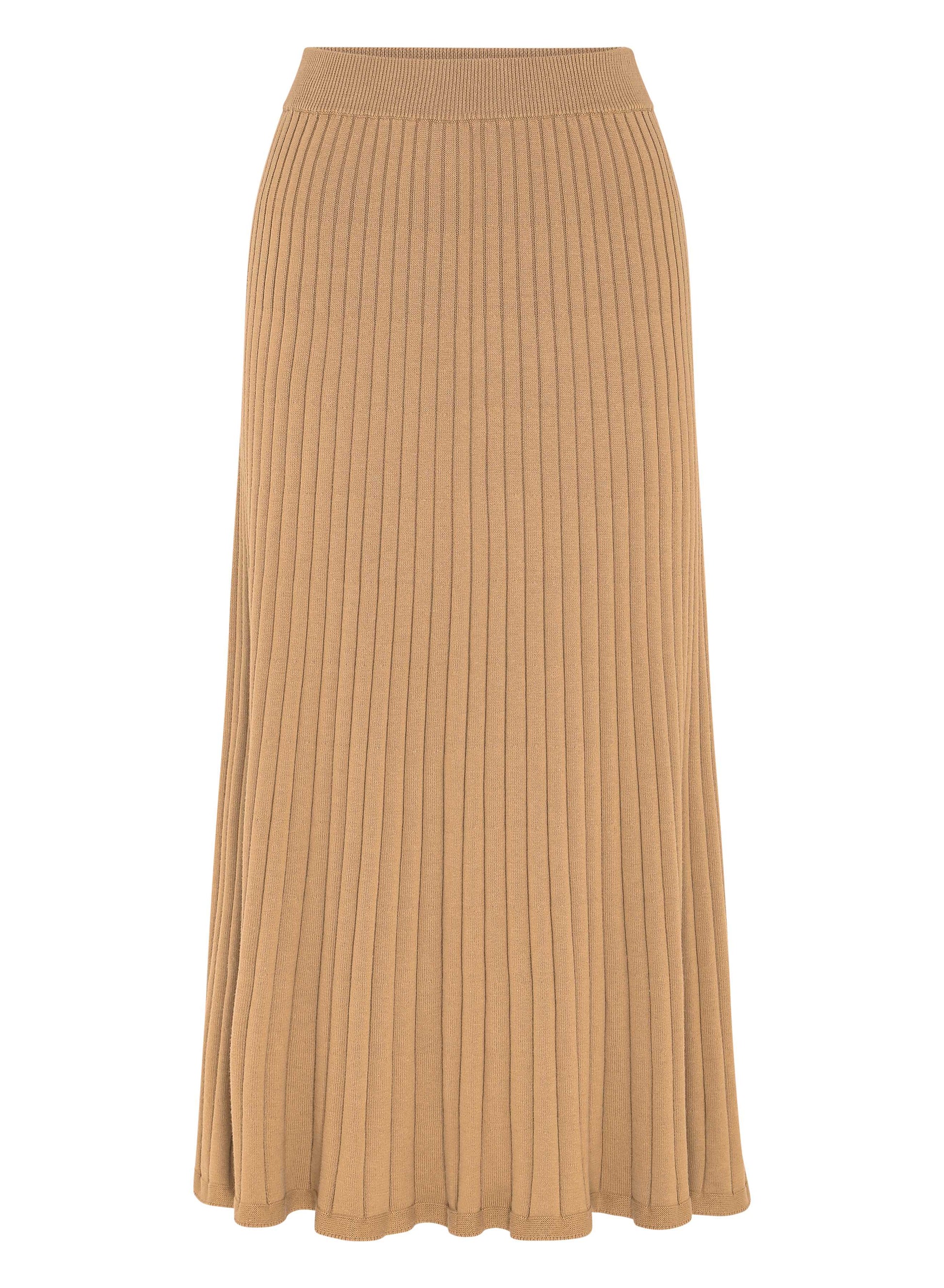 Elevate your wardrobe with ANNA QUAN'S Cotton Rib Midi Skirt featuring a flared hem in the enchanting shade of Macchiato. This midi skirt effortlessly transitions from everyday casual chic to sophisticated elegance, making it a versatile wardrobe essential. Midi knit skirt, everyday knit skirt, everyday midi skirt, work skirts, everyday work skirt, long work skirts, conservative work skirts.