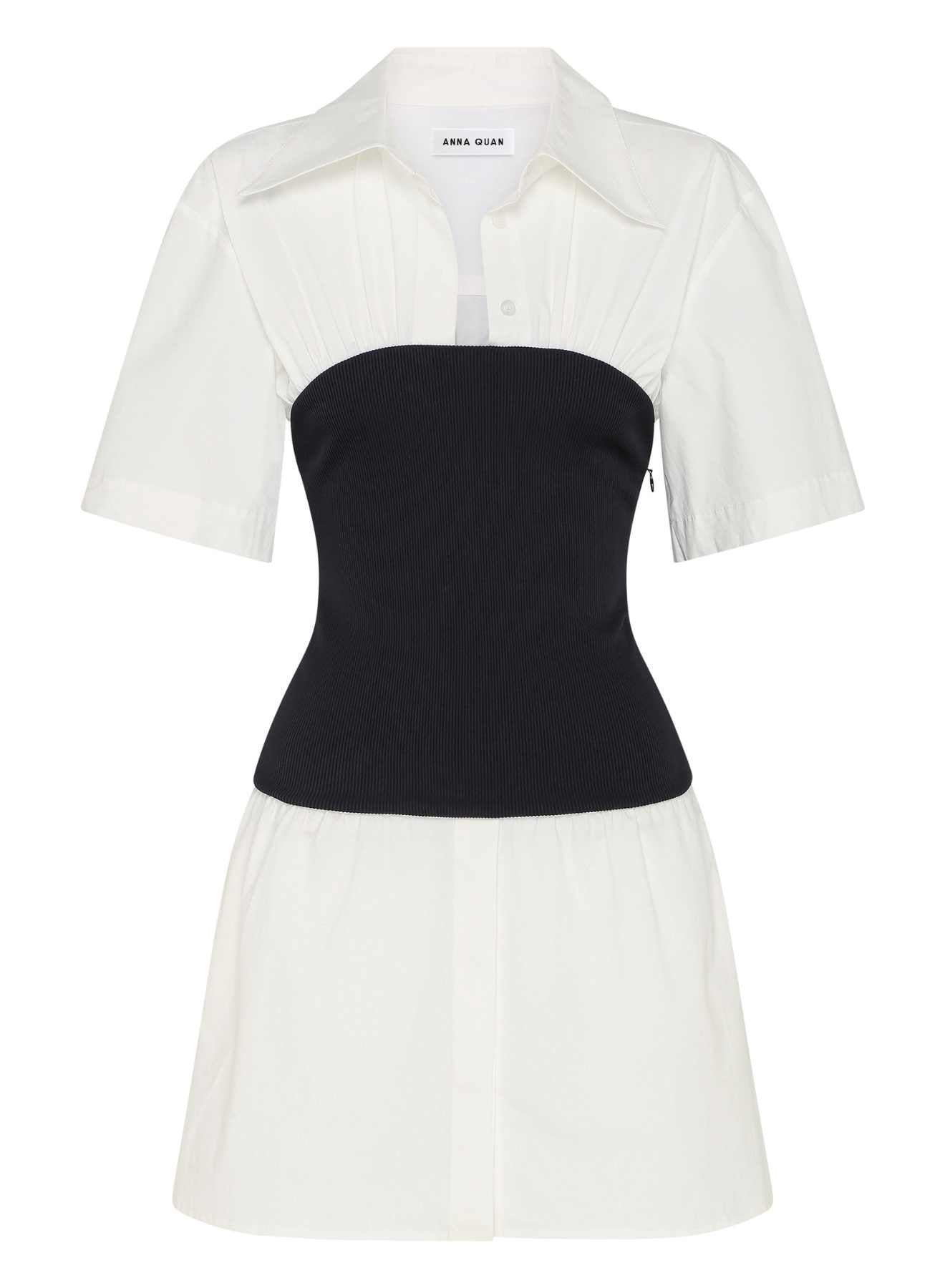 ANNA QUAN's unique Soft Tailoring Mini White Shirt Dress, featuring a contrast jersey rib column skirt. This chic fusion of elements combines the timeless appeal of a white shirt with a modern twist in the torso. White shirt dress, cotton shirt dress, mixed media dress, every day dress, elevated every day dress.