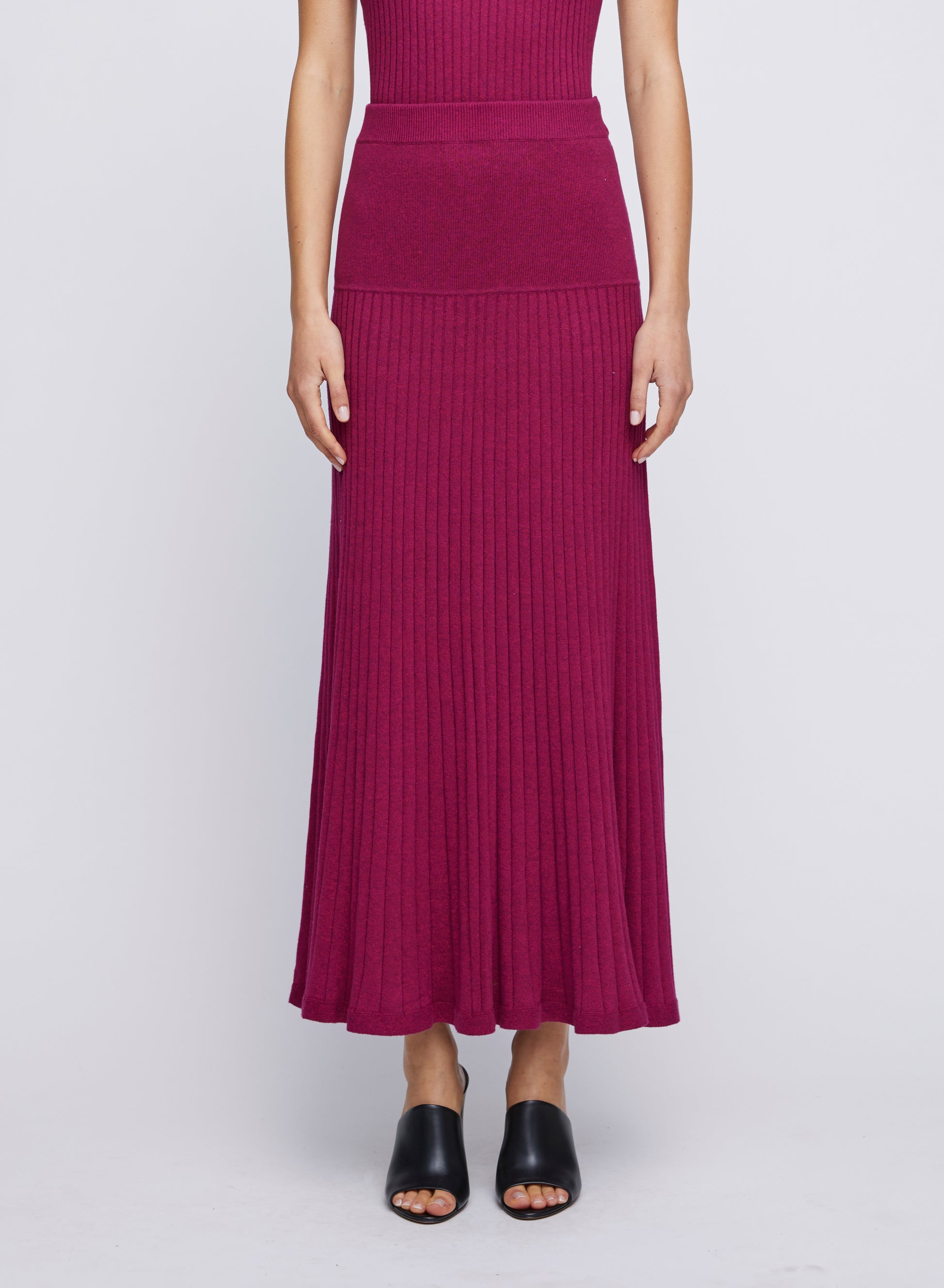 Cotton rib panelled A-line skirt with elasticated waistband. Knit skirt, red skirts, cherry skirts, full length skirts, casual skirts, everyday skirts, skirts for work.