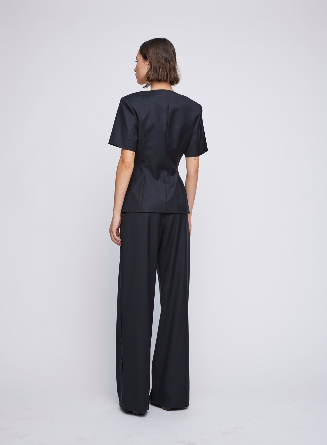 Tailored Short Sleeve Button-Up Workwear Top with square neckline and button front. Work tops, workwear tops, tailored tops.